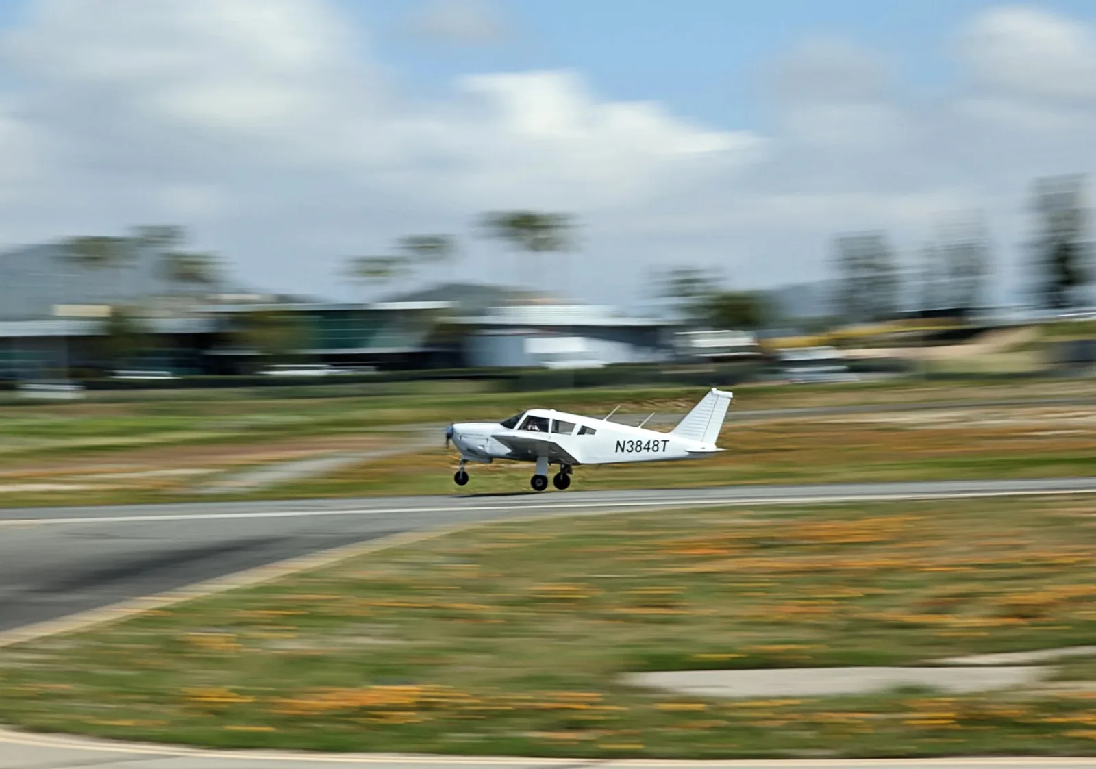 Training aircraft departing Riverside Municipal (KRAL) on a cross-country flight